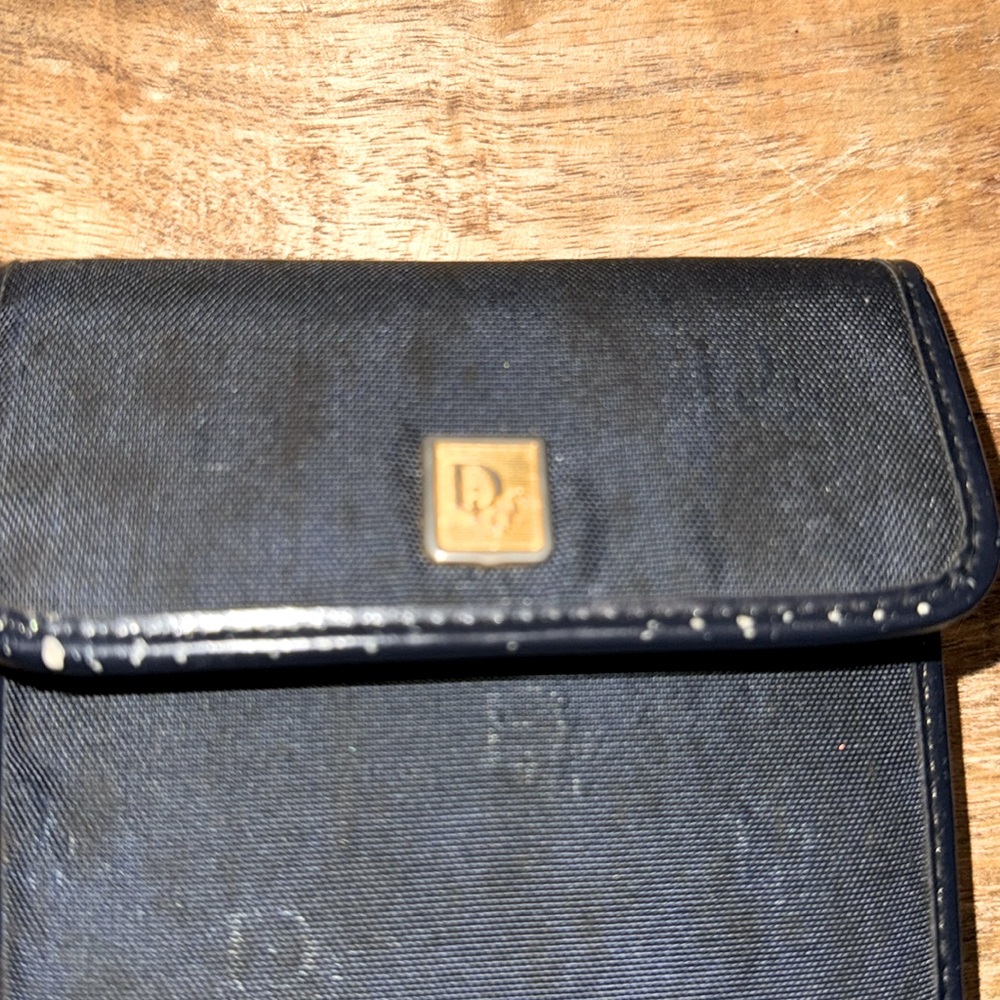 Beautiful vintage small Christian Dior wallet with built in snap coin purse.